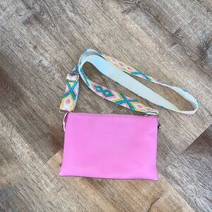 Vibrant Pink Crossbody Bag with Colorful Strap